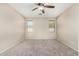 Spacious bedroom with two windows and ceiling fan at 832 E Stottler Dr, Gilbert, AZ 85296