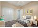Cozy bedroom with a twin bed and ample closet space at 832 E Stottler Dr, Gilbert, AZ 85296