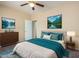 Comfortable bedroom with a queen bed and window at 832 E Stottler Dr, Gilbert, AZ 85296