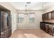Kitchen with dark cabinets and granite counters at 832 E Stottler Dr, Gilbert, AZ 85296