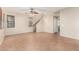 Bright living room with tile floors and staircase at 832 E Stottler Dr, Gilbert, AZ 85296