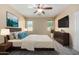 Large main bedroom with a king bed and plenty of natural light at 832 E Stottler Dr, Gilbert, AZ 85296