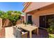Patio with wooden table and chairs, great for outdoor dining at 832 E Stottler Dr, Gilbert, AZ 85296