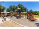 Modern playground with slides, climbing structures, and shaded areas at 832 E Stottler Dr, Gilbert, AZ 85296
