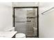 Clean shower with a built-in seat and glass enclosure at 832 E Stottler Dr, Gilbert, AZ 85296