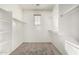 Spacious walk-in closet with ample shelving and hanging rods at 832 E Stottler Dr, Gilbert, AZ 85296