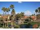 Community features lake, fountain, and Spanish-style homes at 9711 E Mountain View Rd # 1545, Scottsdale, AZ 85258