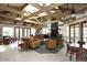 Relaxing community room with fireplace, comfortable seating, and high ceilings at 9711 E Mountain View Rd # 1545, Scottsdale, AZ 85258