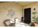 Inviting entryway with seating area and decorative wall art at 9711 E Mountain View Rd # 1545, Scottsdale, AZ 85258