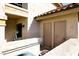 Exterior view of the condo building with two private entrances at 9711 E Mountain View Rd # 1545, Scottsdale, AZ 85258