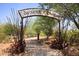 Entrance to community garden with unique archway at 9711 E Mountain View Rd # 1545, Scottsdale, AZ 85258