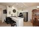 Modern kitchen with stainless steel appliances and a breakfast bar at 9711 E Mountain View Rd # 1545, Scottsdale, AZ 85258