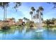 Scenic lake with fountain and lush landscaping at 9711 E Mountain View Rd # 1545, Scottsdale, AZ 85258