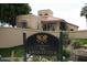 Racquet club entrance with a sign and landscaping at 9711 E Mountain View Rd # 1545, Scottsdale, AZ 85258