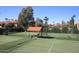 Several lighted tennis courts with seating areas at 9711 E Mountain View Rd # 1545, Scottsdale, AZ 85258