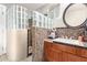 Bathroom with granite vanity and a glass block shower at 9944 E Akron St, Mesa, AZ 85207