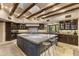Gourmet kitchen with a large center island, granite countertops, stainless steel appliances, and custom cabinetry at 5747 E Mockingbird Ln, Paradise Valley, AZ 85253