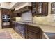 Custom kitchen with detailed cabinetry, stainless steel appliances, and a blue Lacanche gas range at 5747 E Mockingbird Ln, Paradise Valley, AZ 85253