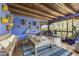 Inviting outdoor patio featuring a colorful design, decorative accents, and rustic furniture at 5747 E Mockingbird Ln, Paradise Valley, AZ 85253