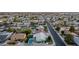 Aerial view of a house with a pool in a residential neighborhood at 10395 N 73Rd Dr, Peoria, AZ 85345