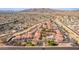 Aerial view showcasing community pool and buildings at 10610 S 48Th St # 2089, Phoenix, AZ 85044
