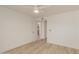 Bedroom with wood-look floors and a view of the kitchen at 10610 S 48Th St # 2089, Phoenix, AZ 85044