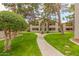 Well-maintained grounds featuring grassy areas and walkways at 10610 S 48Th St # 2089, Phoenix, AZ 85044