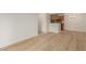 Dining area with light wood floors and kitchen view at 10610 S 48Th St # 2089, Phoenix, AZ 85044