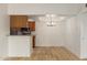 Kitchen with wood cabinets, granite counters, and appliances at 10610 S 48Th St # 2089, Phoenix, AZ 85044