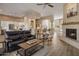 Spacious living room with a fireplace and hardwood floors at 11754 E Mariposa Grande Dr, Scottsdale, AZ 85255