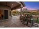 Relaxing patio with seating area and pool views at 11754 E Mariposa Grande Dr, Scottsdale, AZ 85255