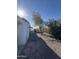 Backyard view with storage shed and gravel at 120 N Val Vista Dr # 38, Mesa, AZ 85213