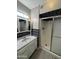 Bathroom with walk-in shower and granite vanity at 120 N Val Vista Dr # 38, Mesa, AZ 85213