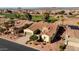 Aerial view of single-story home with tile roof, and a two-car garage at 12920 W Figueroa Dr, Sun City West, AZ 85375