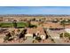 One-story home with a tile roof and a view of the golf course at 12920 W Figueroa Dr, Sun City West, AZ 85375