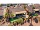 Backyard oasis with putting green and covered patio at 12920 W Figueroa Dr, Sun City West, AZ 85375