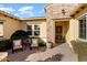 Charming courtyard with brick paving, seating area, and access to the home at 12920 W Figueroa Dr, Sun City West, AZ 85375
