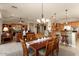 Open dining area with a view of kitchen and Gathering room at 12920 W Figueroa Dr, Sun City West, AZ 85375