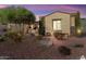 Well-maintained home with mature trees and desert landscaping at 12920 W Figueroa Dr, Sun City West, AZ 85375