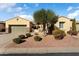 Single-story home with a landscaped front yard and two-car garage at 12920 W Figueroa Dr, Sun City West, AZ 85375