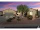 Beautiful desert home with landscaped yard and two-car garage at 12920 W Figueroa Dr, Sun City West, AZ 85375
