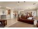Open floor plan living room with a view of the kitchen and dining area at 12920 W Figueroa Dr, Sun City West, AZ 85375