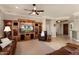 Open living space with a view of the kitchen and entryway at 12920 W Figueroa Dr, Sun City West, AZ 85375