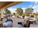 Spacious covered patio overlooking golf course at 12920 W Figueroa Dr, Sun City West, AZ 85375