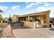 Spacious covered patio with an outdoor kitchen and bar at 12920 W Figueroa Dr, Sun City West, AZ 85375