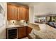 Convenient wet bar with granite countertops and sink at 12920 W Figueroa Dr, Sun City West, AZ 85375