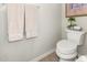 Small bathroom with toilet and linen towels at 1329 N Balboa --, Mesa, AZ 85205