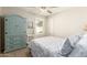 Bedroom with rustic armoire and floral bedding at 1329 N Balboa --, Mesa, AZ 85205