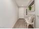 Bright and airy entryway with a rustic bench and wood flooring at 1329 N Balboa --, Mesa, AZ 85205