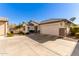 Single-story home with a two-car garage and nicely landscaped yard at 1329 N Balboa --, Mesa, AZ 85205